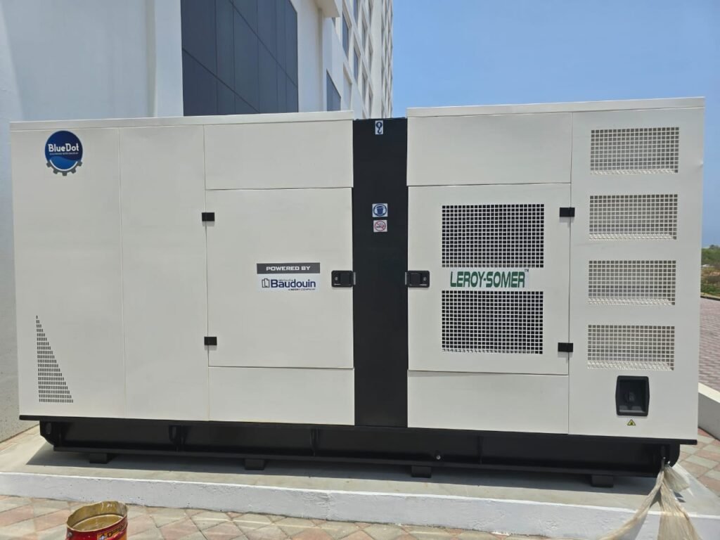A white diesel generator in open area.