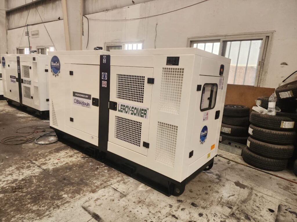 white generators with tires on background