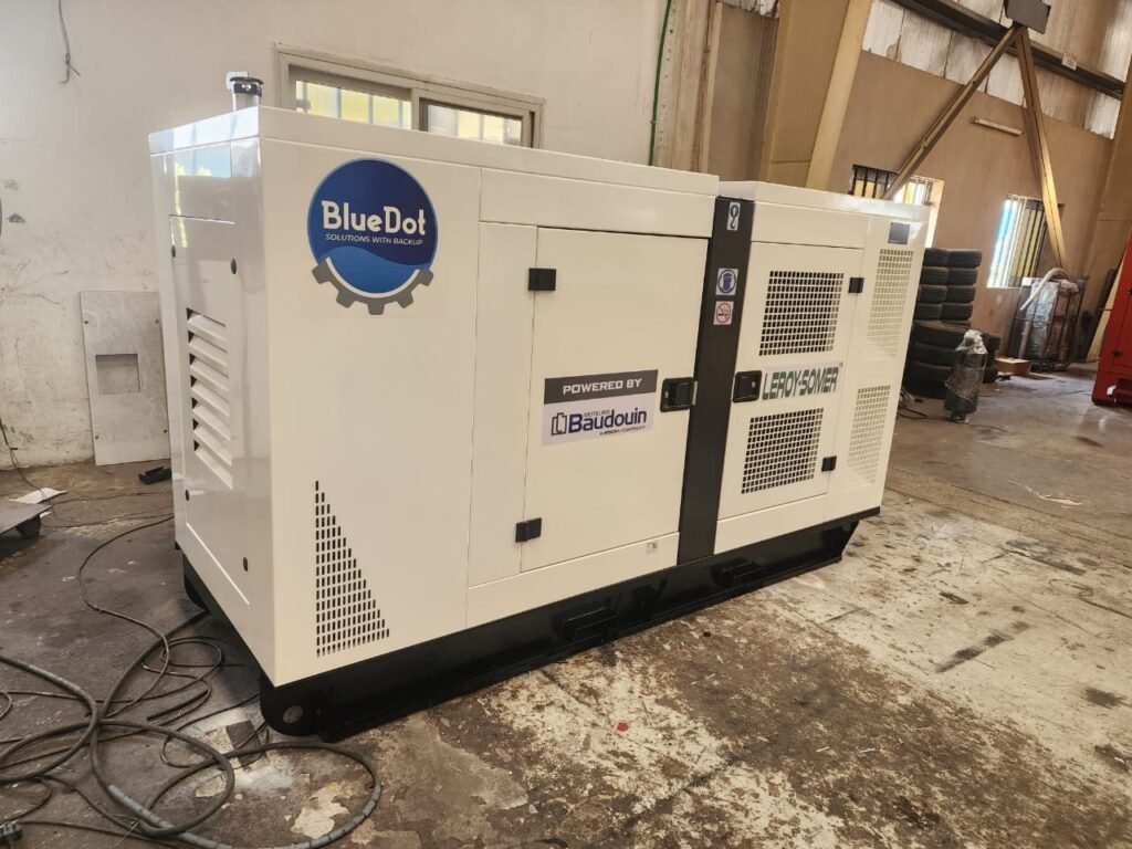 A white diesel generator on surface.